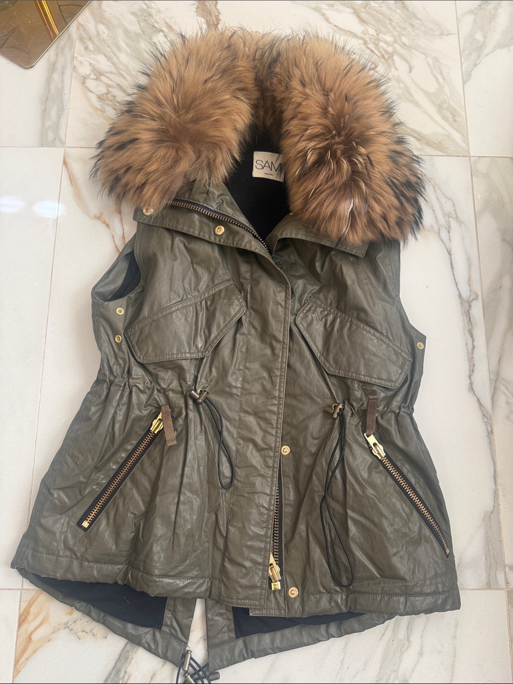 SAM VEST WITH REAL RACCOON FUR